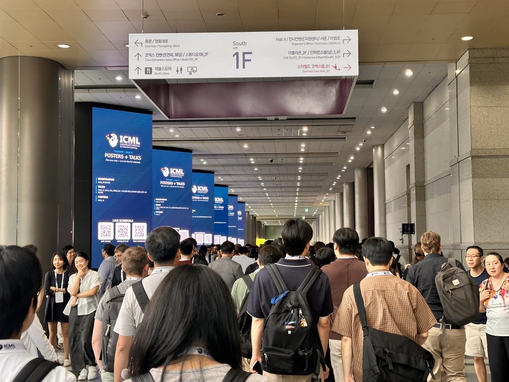 The busy ICML 2026 conference floor at COEX